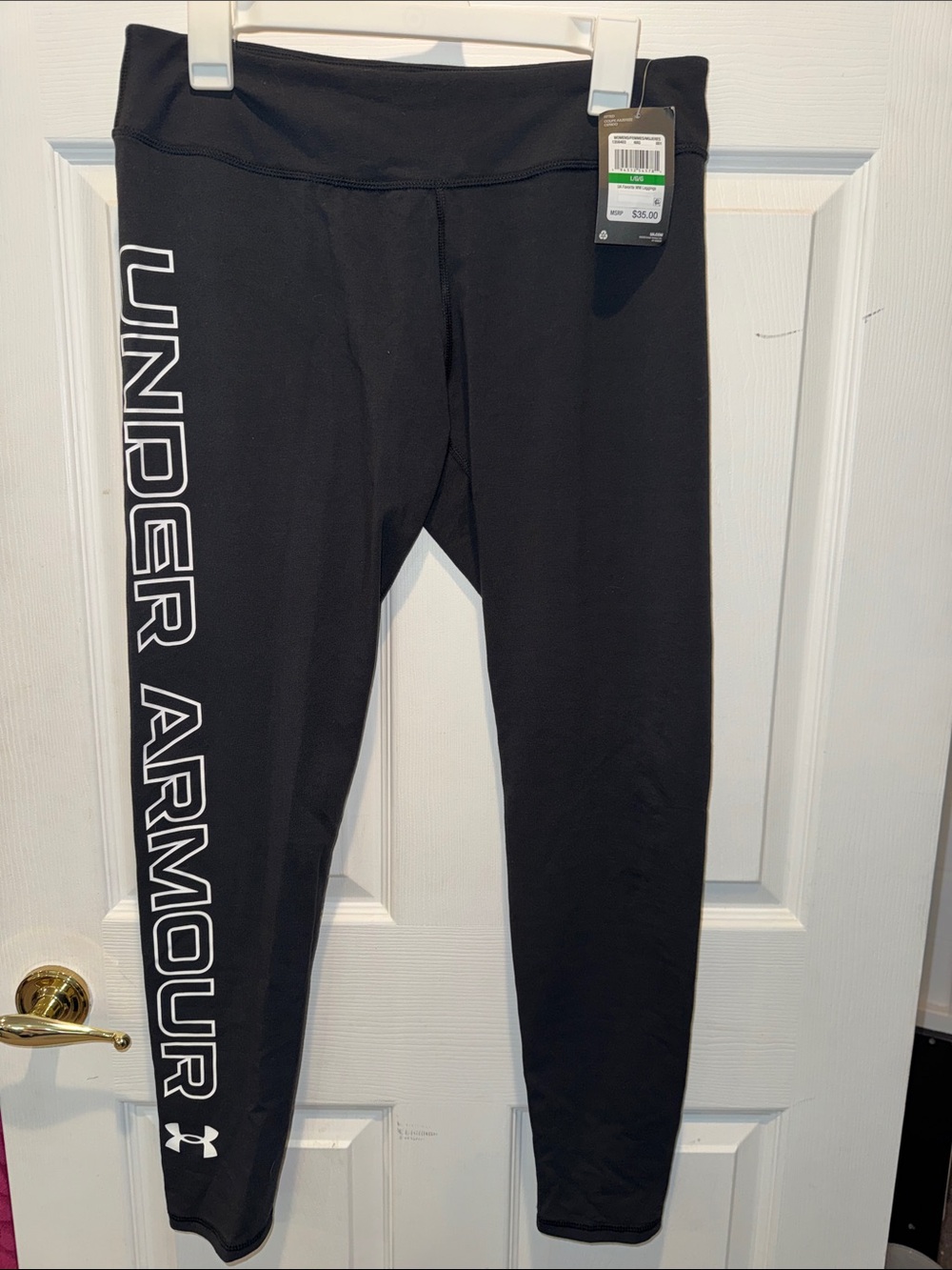 Women’s Under Armour Black Performance Leggings with White Side Branding